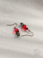 Red Rosebud Crystal Dangle Earrings in Antique Brass