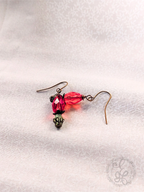 Red Rosebud Crystal Dangle Earrings in Antique Brass
