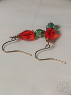 Red Rosebud Crystal Dangle Earrings in Antique Brass