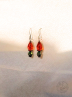 Red Rosebud Crystal Dangle Earrings in Antique Brass